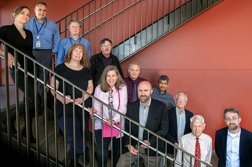 Photo of Advanced Light Source's Scientific Advisory Committee members on Building 15 stairs