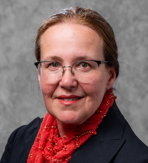 woman wearing glasses and red scarf