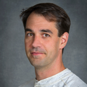 Man with short brown hair. 