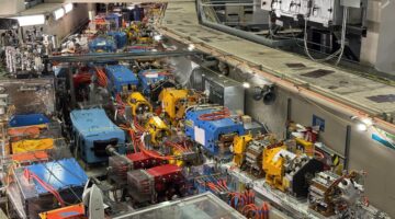 Photo showing the ALS switchyard. The storage ring is on the right, the accumulator ring on the left and two transfer lines (BTS and BTA) are in between.